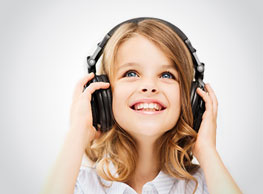 young girl with headphones on